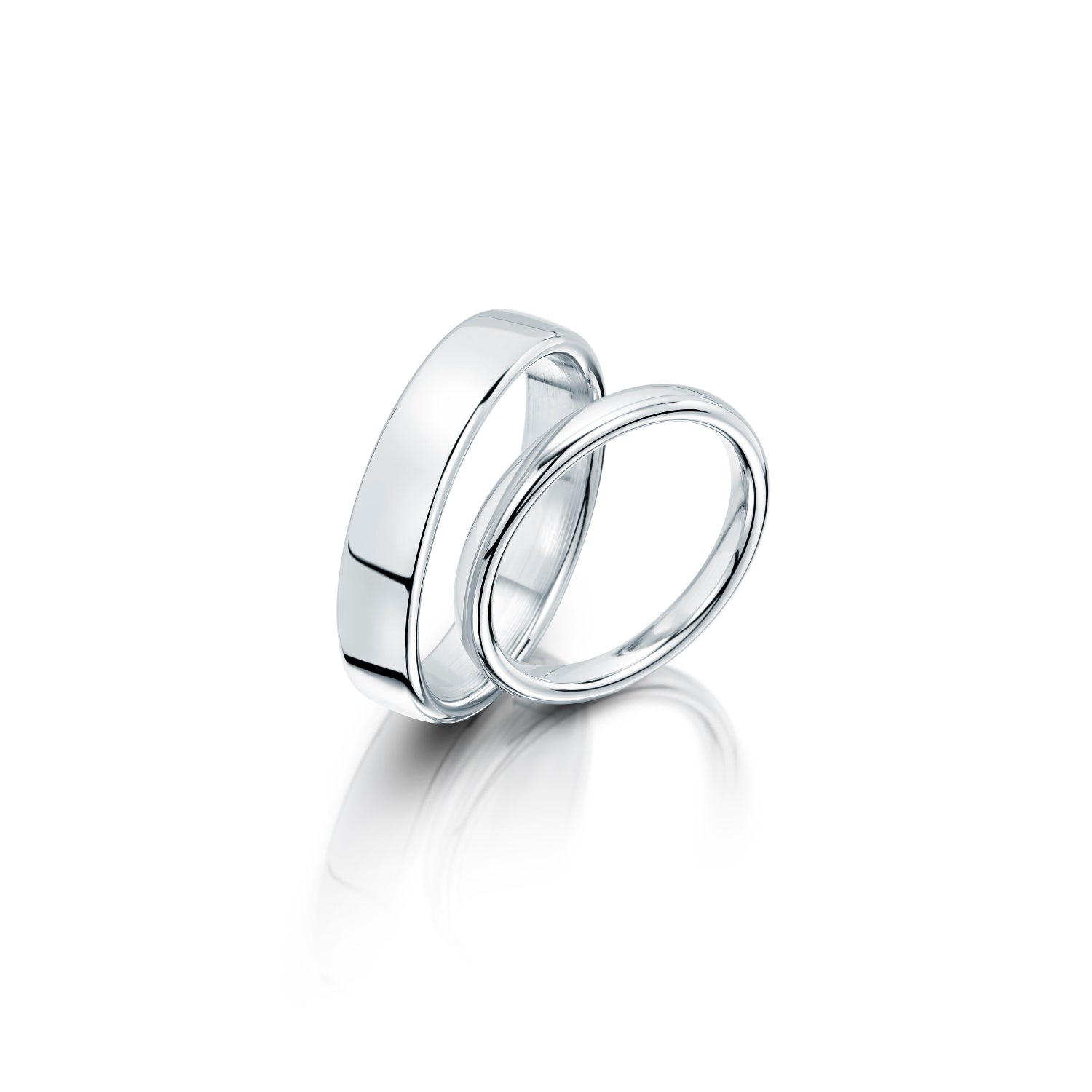 Luxury Wedding Rings pair in platinum for men and women on a white background
