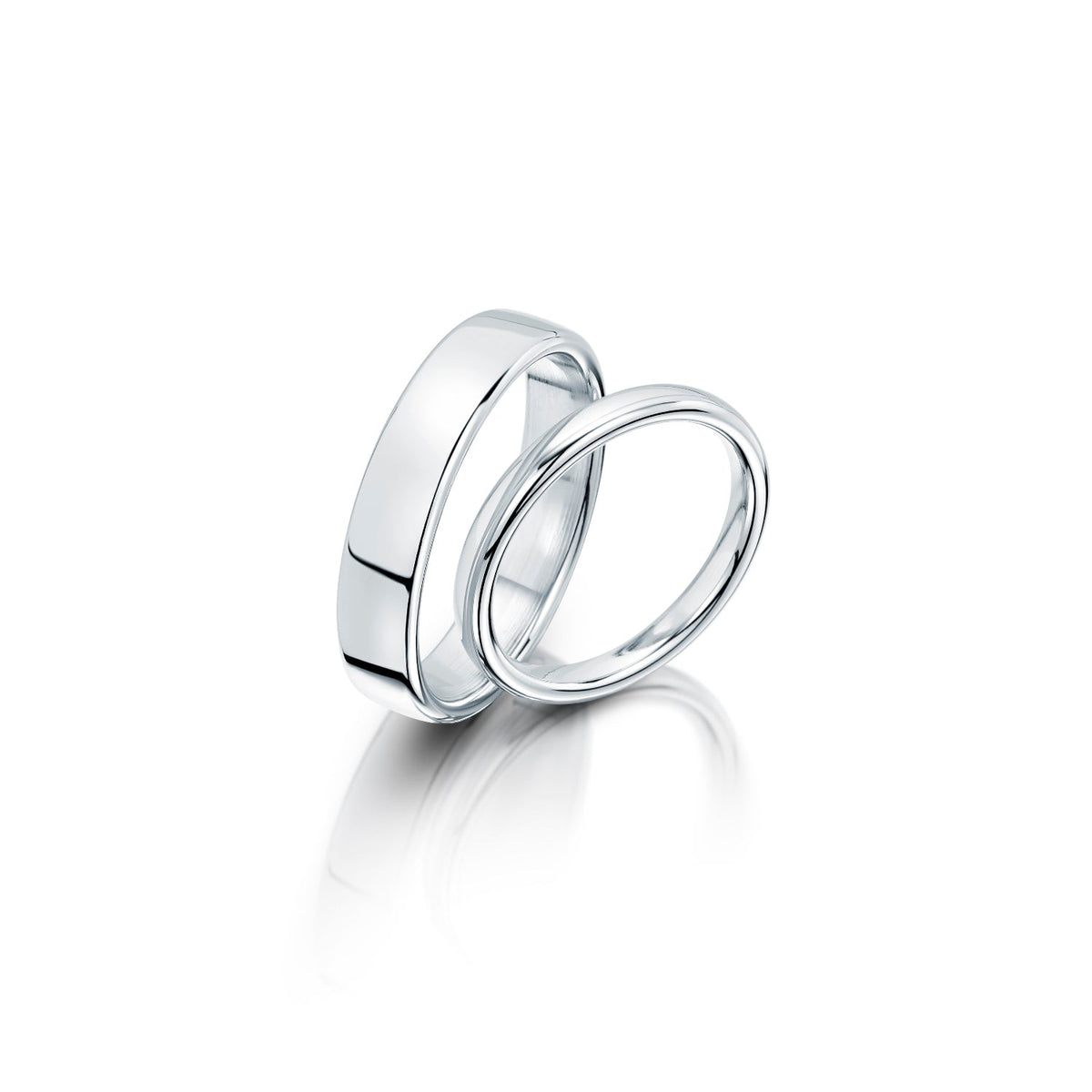 Luxury Wedding Rings pair in platinum for men and women on a white background