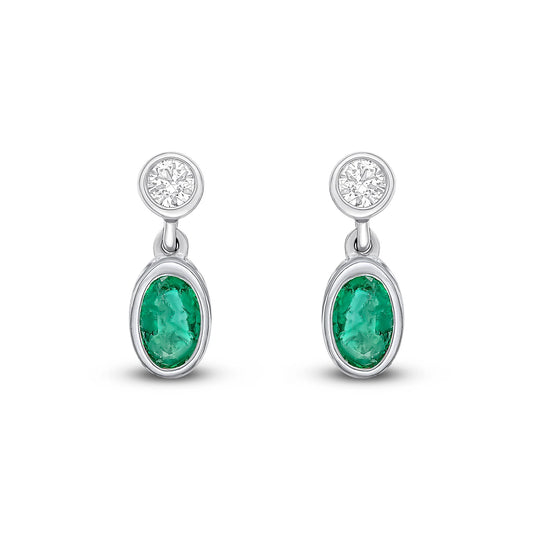 18CT White Gold Oval Emerald & Round Diamond Two Stone Drop Earrings on a white background