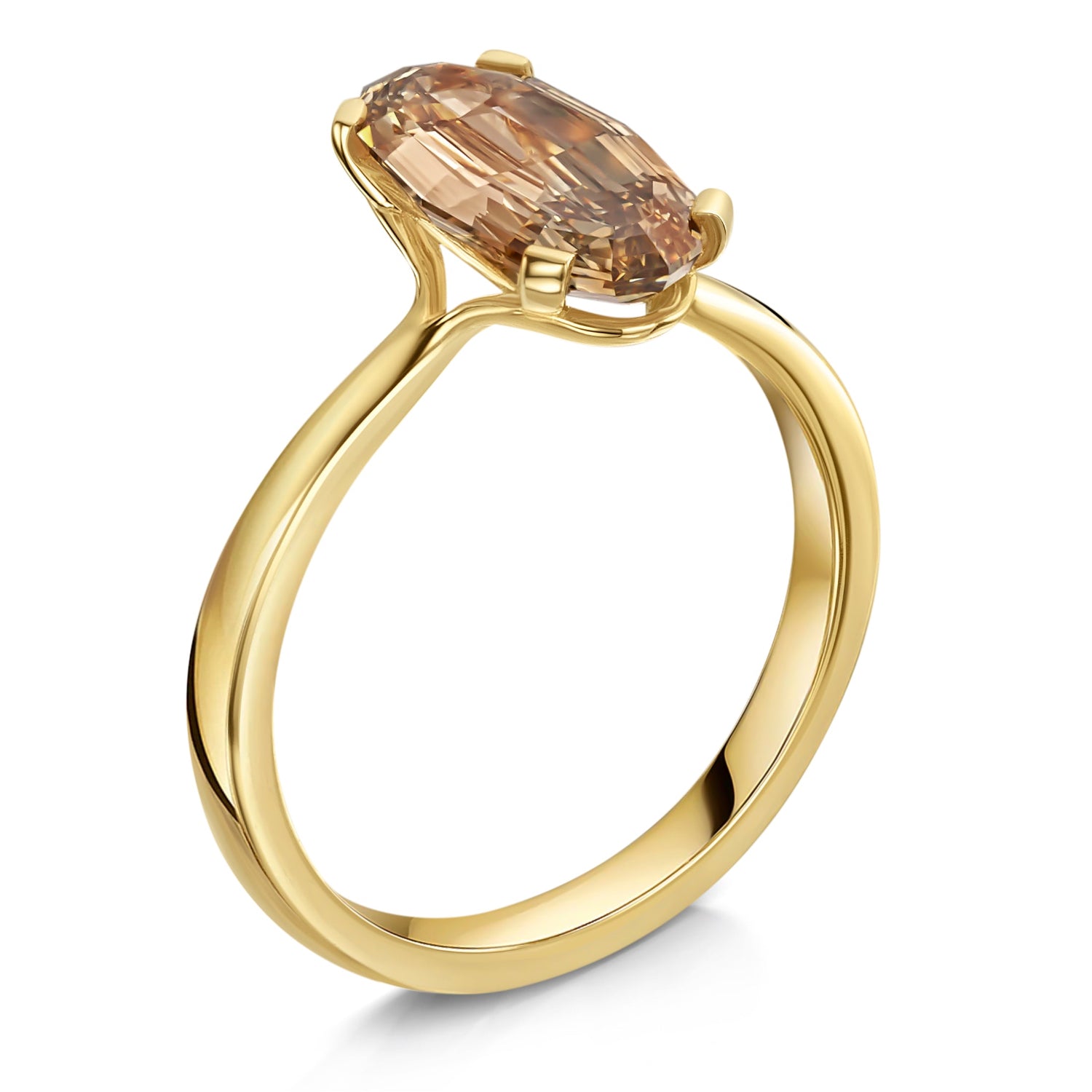 Gold ring with a large brown diamond on a white background