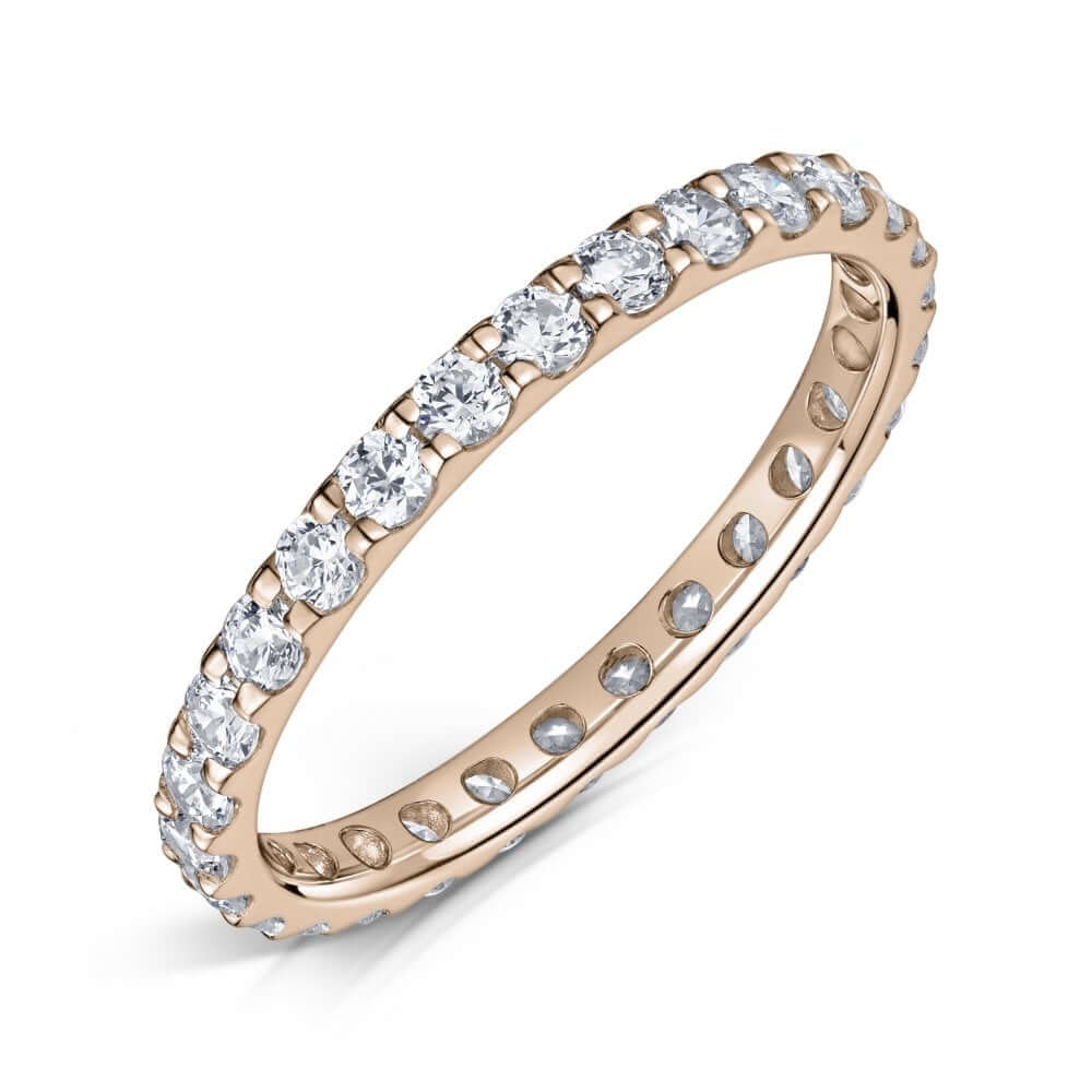 2mm claw set diamond eternity ring in rose gold on a white background