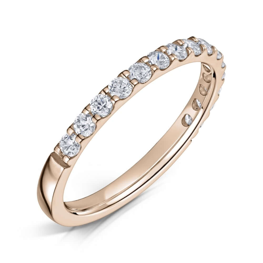 2mm claw set diamond half eternity ring in rose gold on a white background