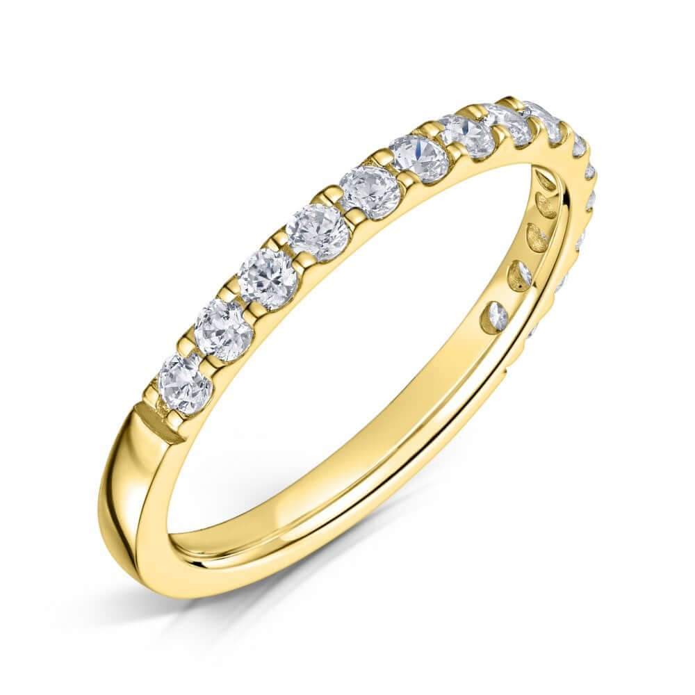 2mm yellow gold claw set diamond half eternity ring on a white background
