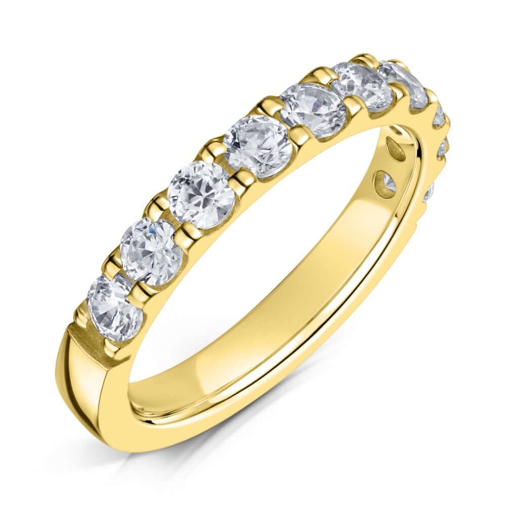 3mm claw set diamond half eternity ring in yellow gold on a white background 