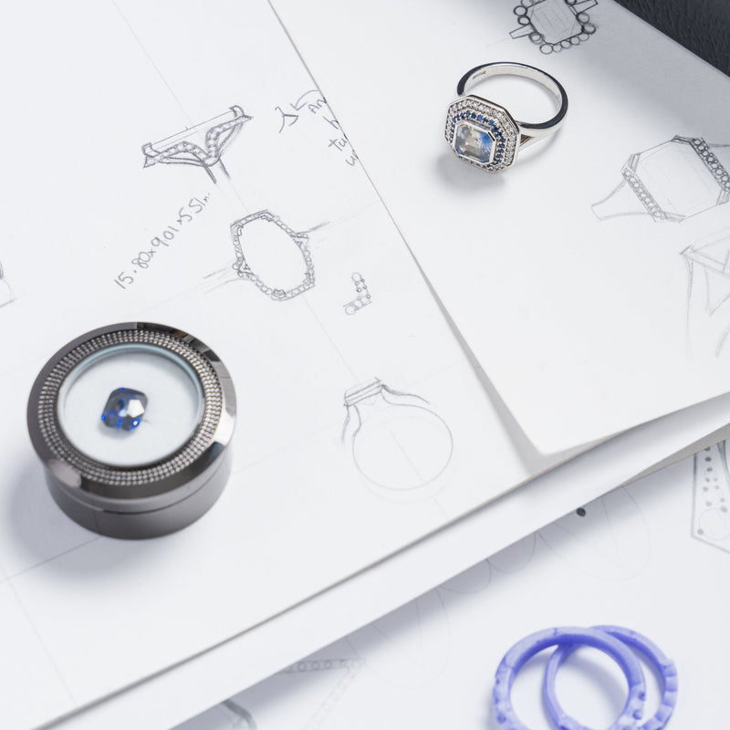 Jewellery design process with a ring on a design sketch