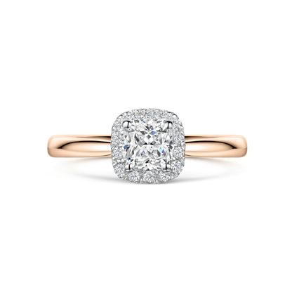 Cushion Cut Diamond Halo Engagement Ring in Rose Gold on white background