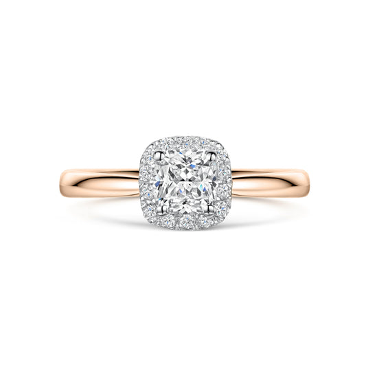 Cushion Cut Diamond Halo Engagement Ring in Rose Gold on white background