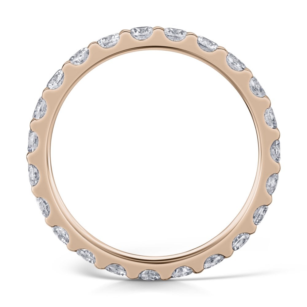 Side view of Rose Gold Eternity ring with 2.5mm diamonds all the way around on a white background.