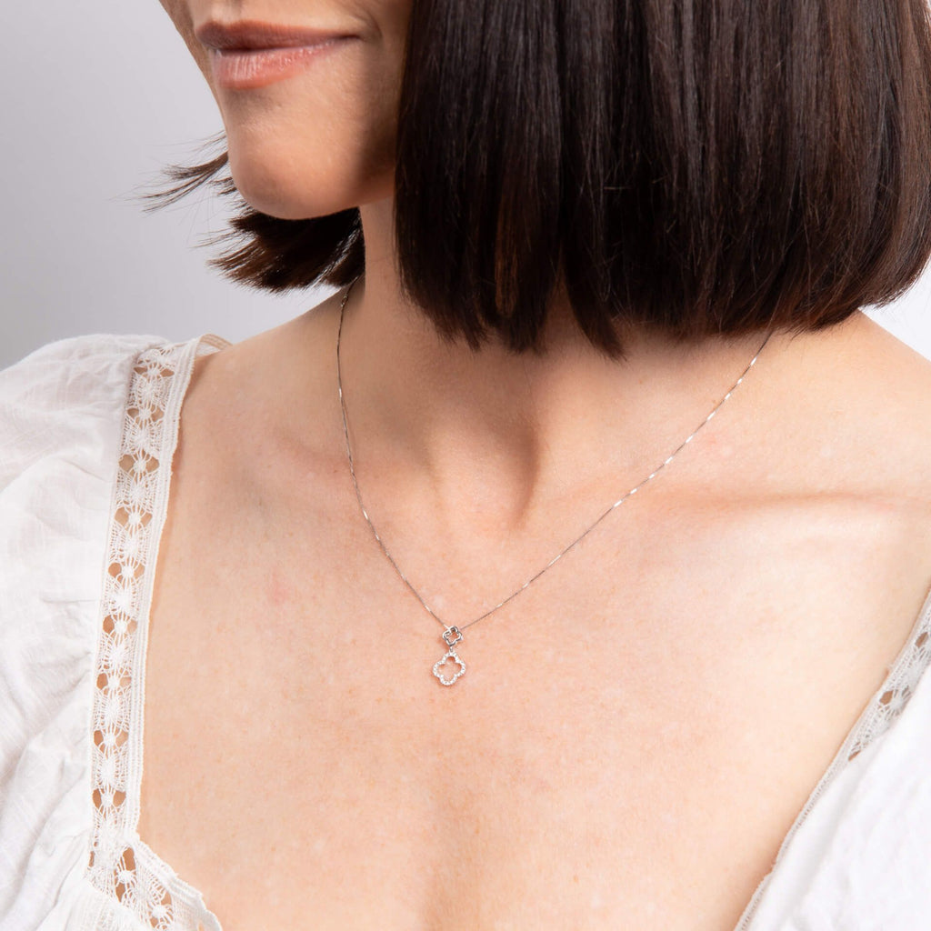 Diamond Clover Necklace in 9ct White Gold on model 
