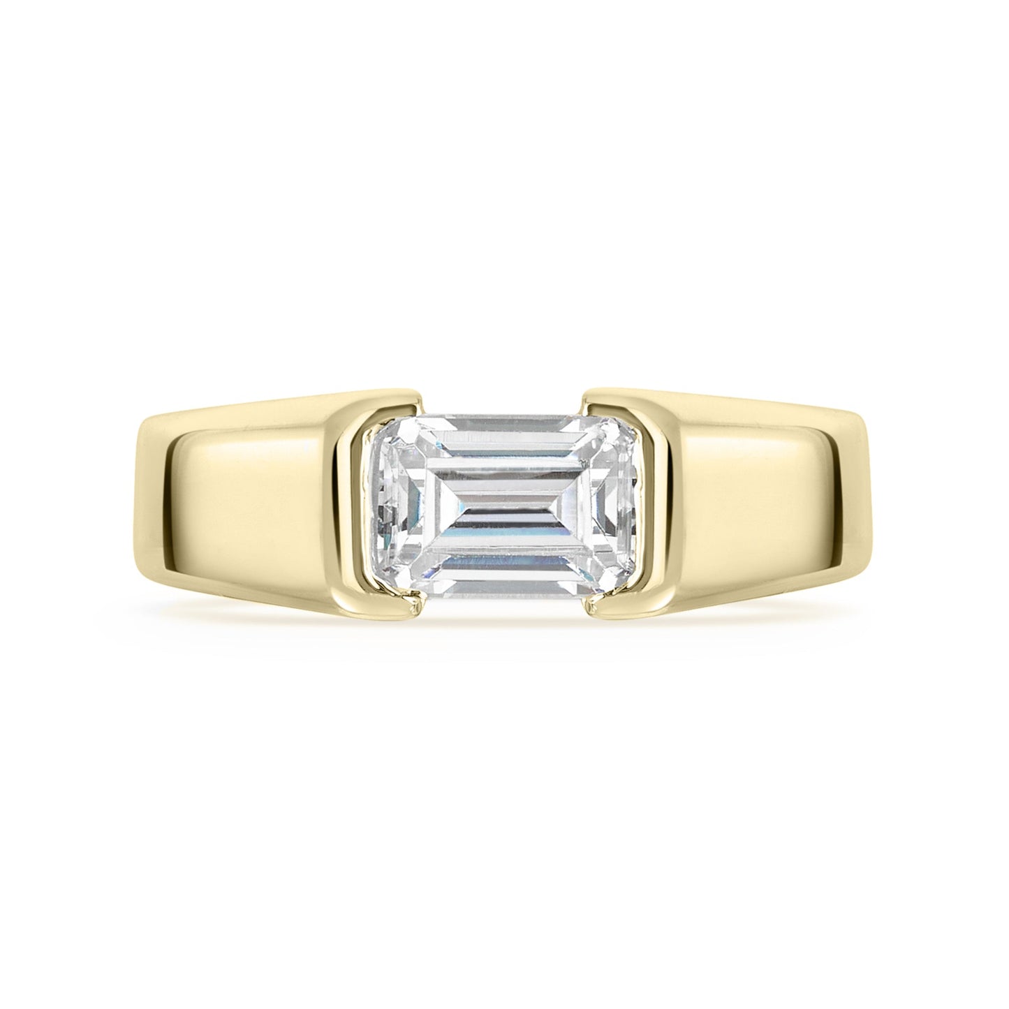 Gold ring with a rectangular diamond on a white background