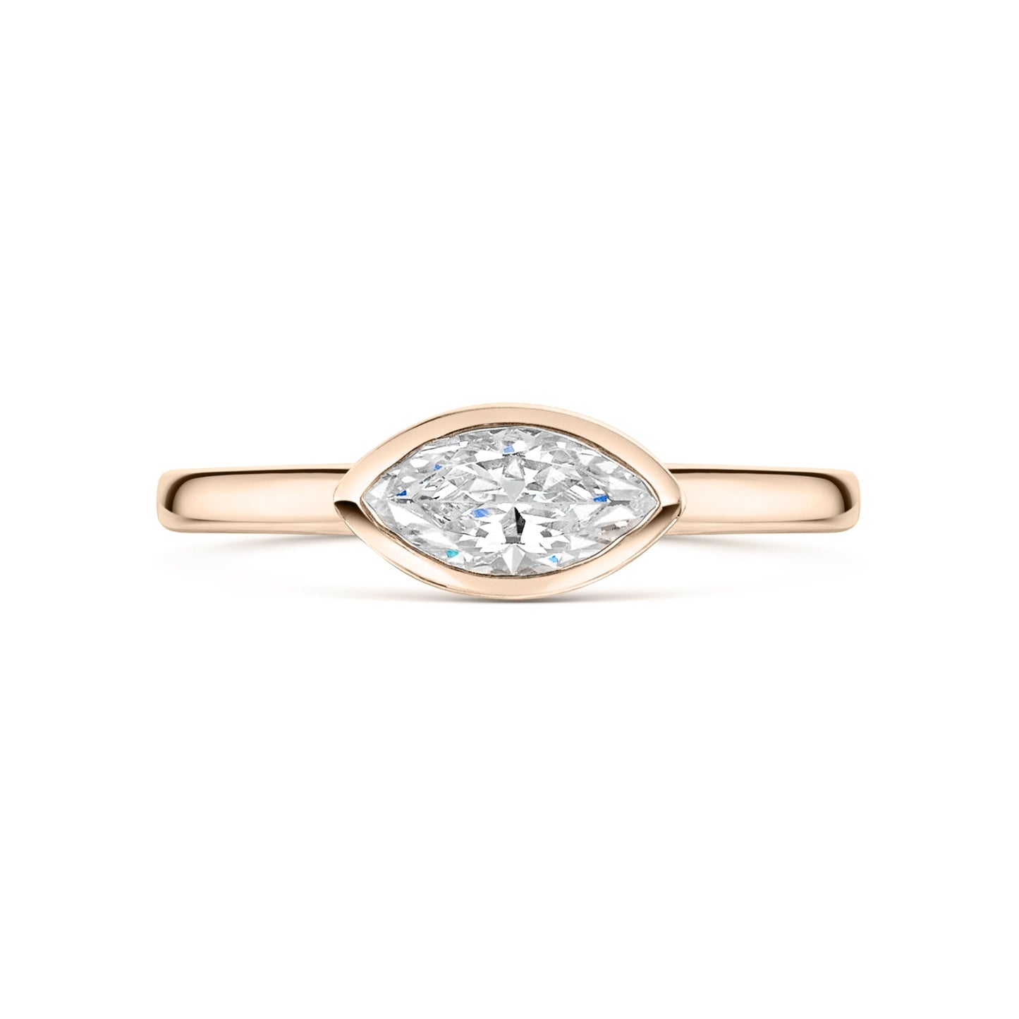 East West Marquise Bezel Set engagement ring in rose gold on a white background 