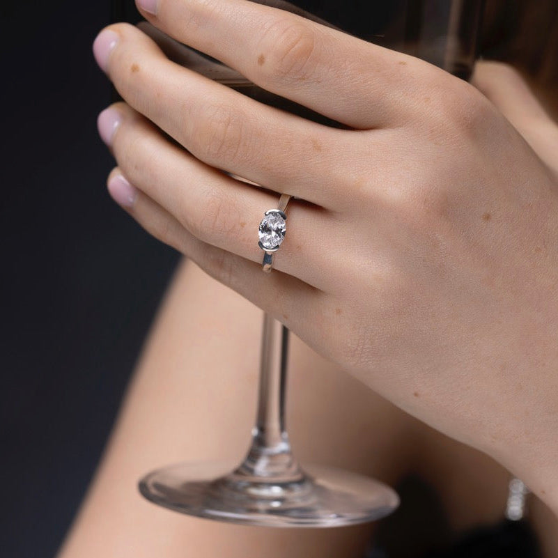 East West Oval Diamond Engagement Ring on models finger