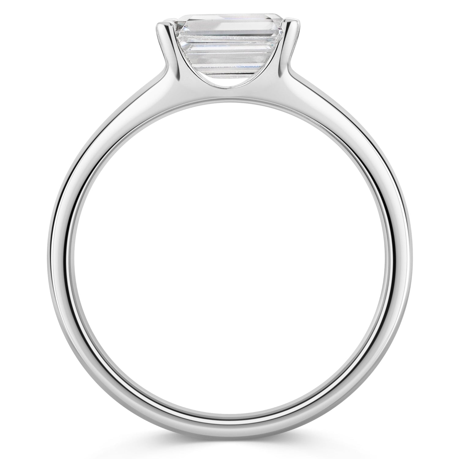 Emerald East West Diamond Engagement Ring in Platinum. Side view on a white background