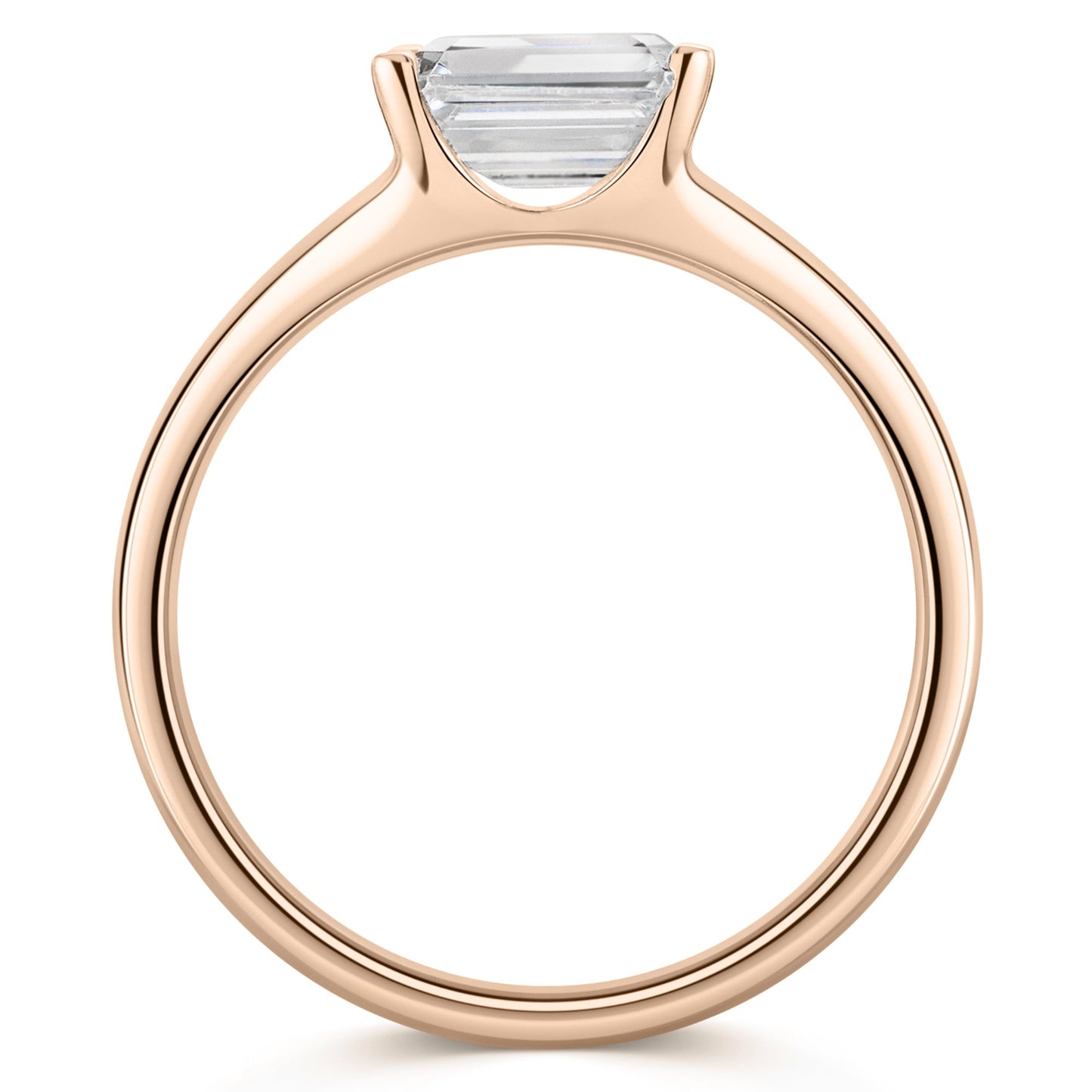 Emerald East West Diamond Engagement Ring in Rose Gold. Side view  on a white background