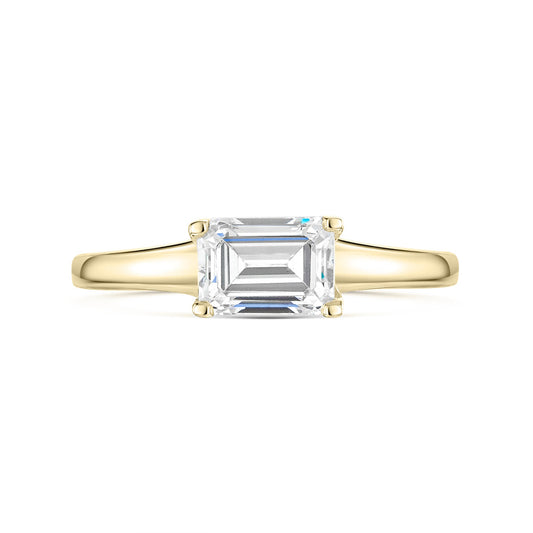 Emerald East West Diamond Engagement Ring in Yellow Gold on a white background