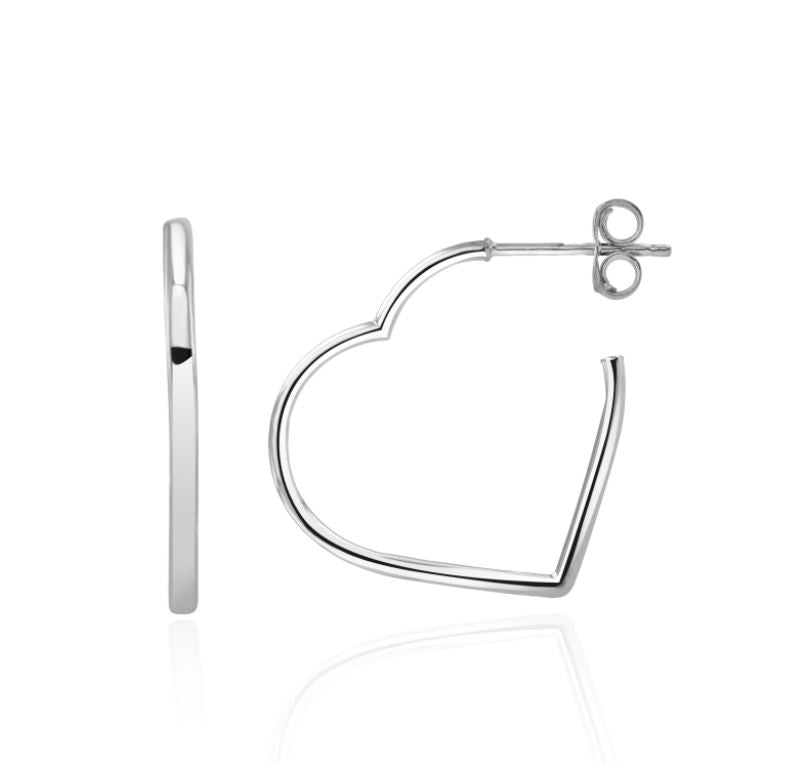 White gold heart shaped hoop earrings on a white background 