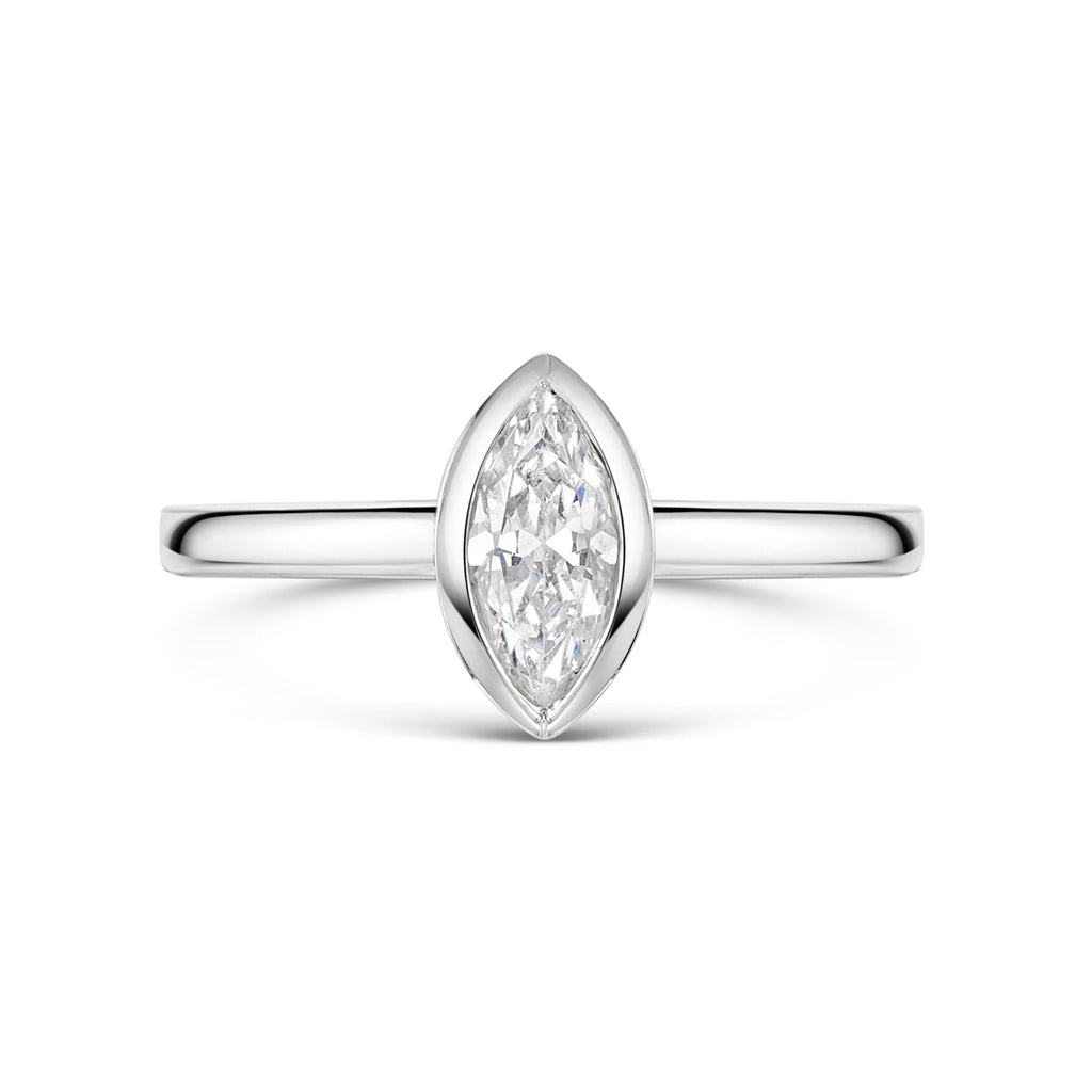 Marquise Bezel Set engagement ring in platinum on a white background 