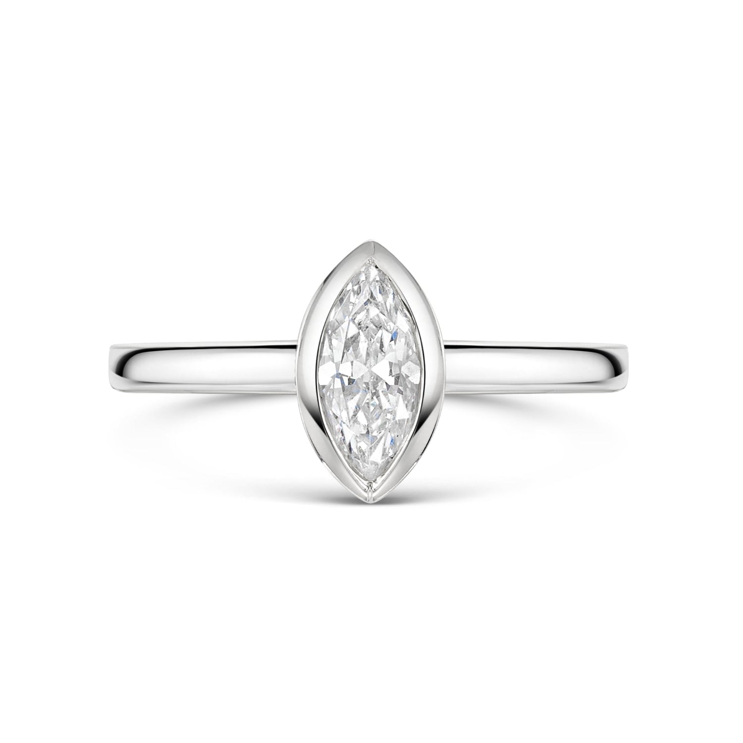 Marquise Bezel Set engagement ring in platinum on a white background 