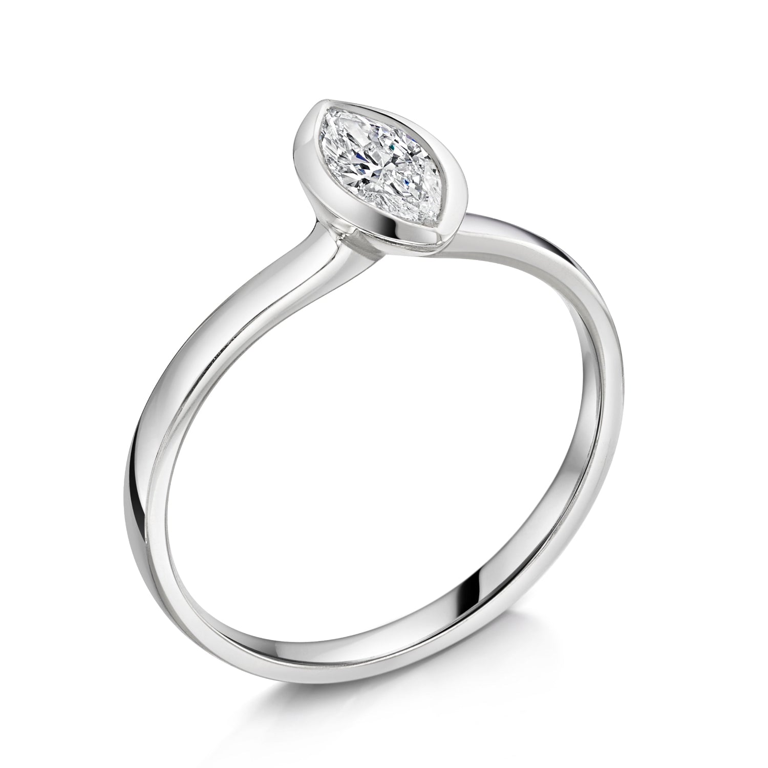 Marquise Bezel Set engagement ring in platinum - Angled view on a white background 