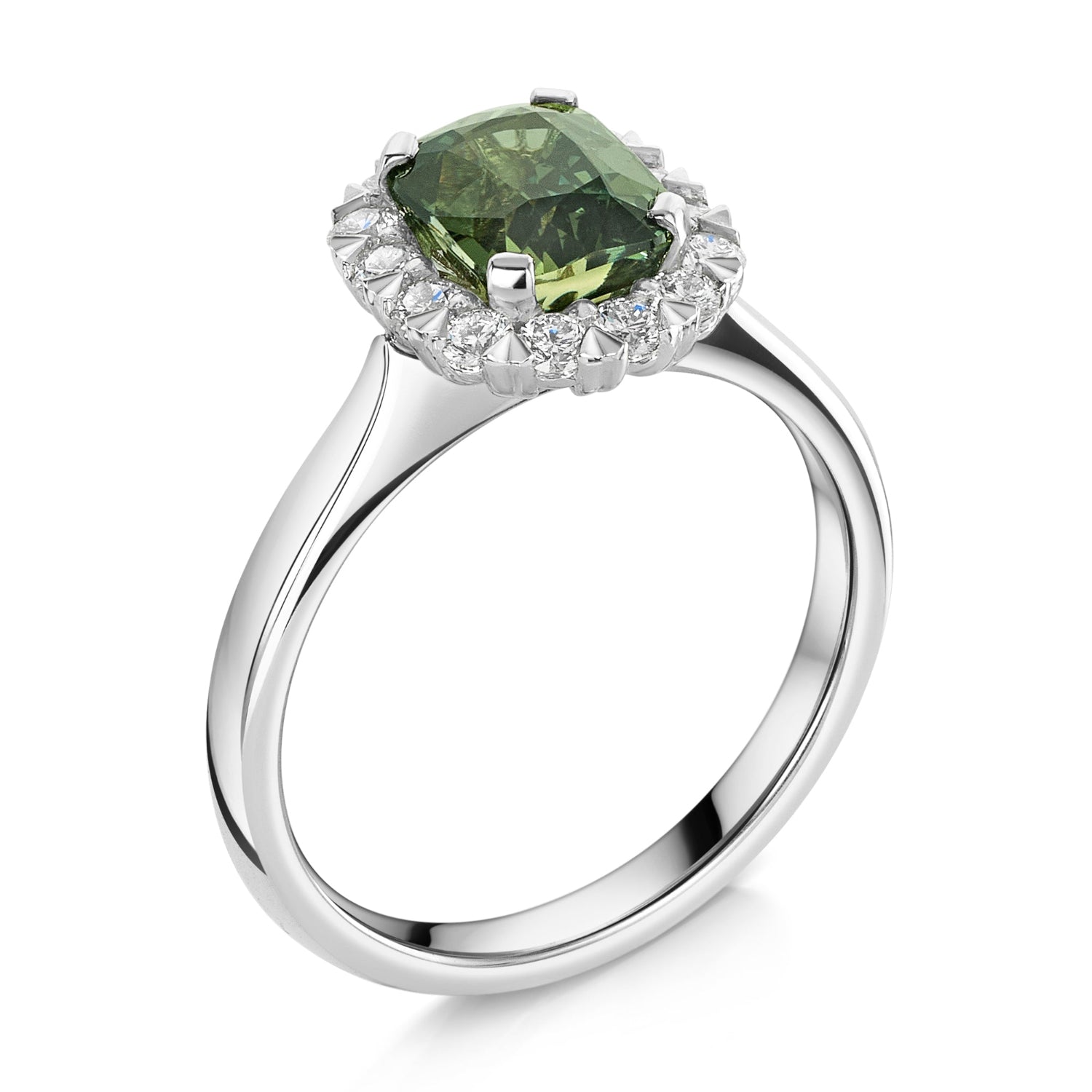 A silver ring featuring a cushion cut green sapphire surrounded by a halo of small white diamonds, set on a polished platinum band against a white background.