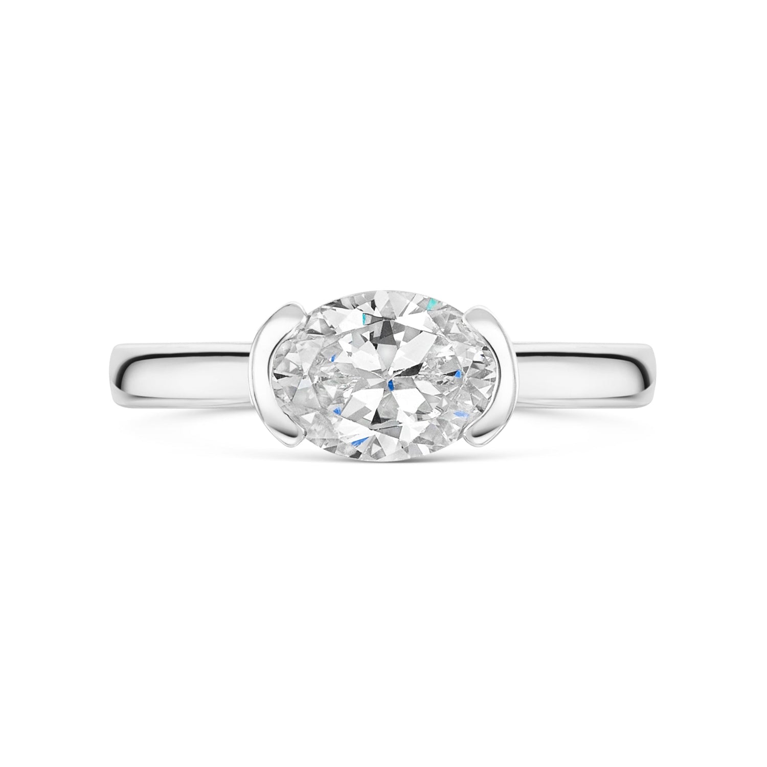Oval East West Semi Bezel Set Solitaire In platinum on a white background