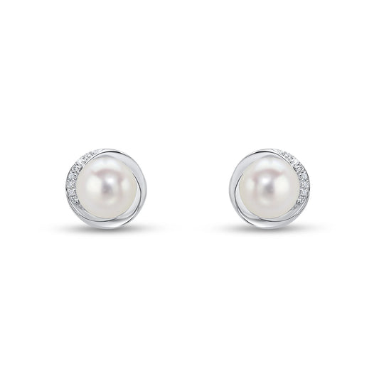 Pearl stud earring with diamond border in white gold on a white background