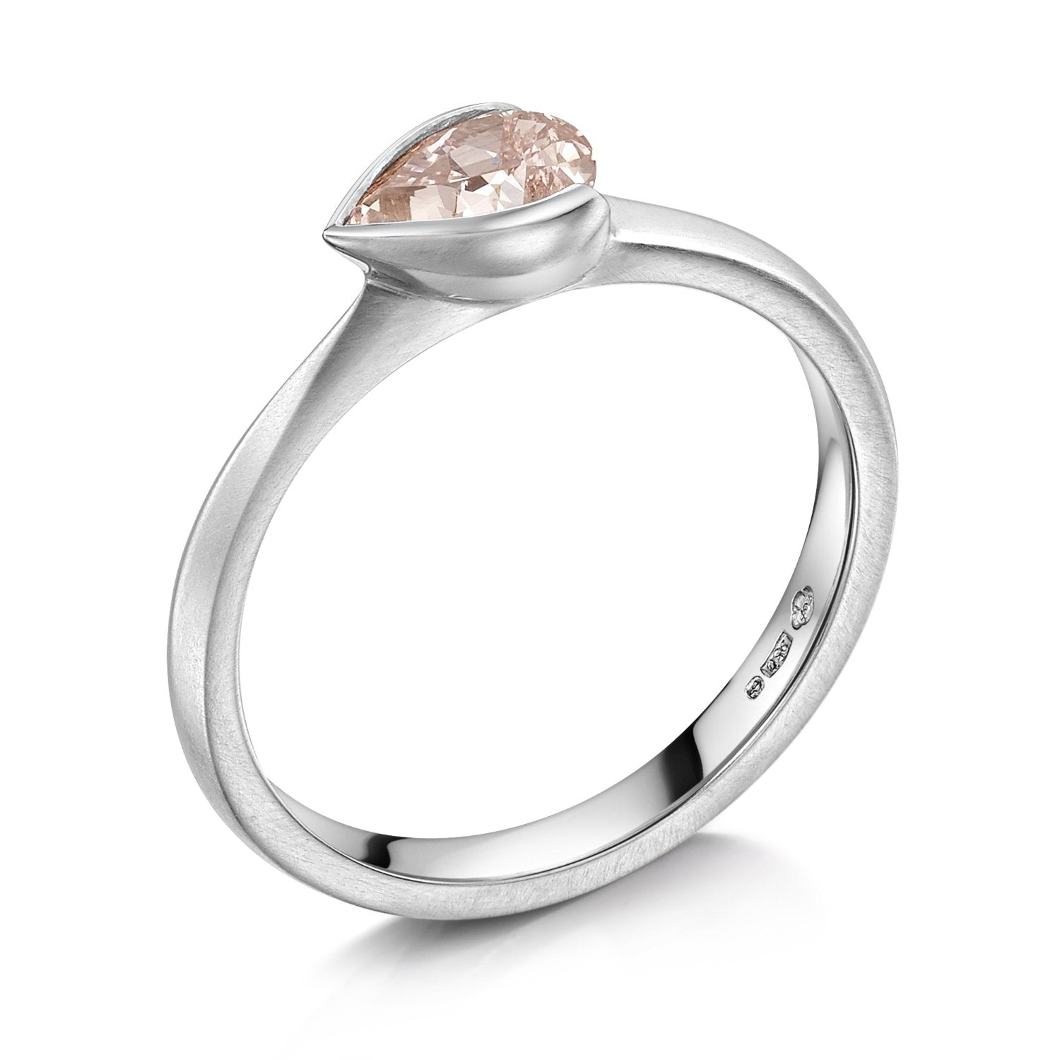 Fancy Pink Diamond Solitaire Ring set in a simple rubover setting