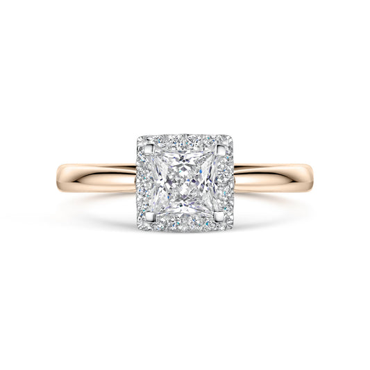 Rose gold diamond halo ring with a square diamond on a white background