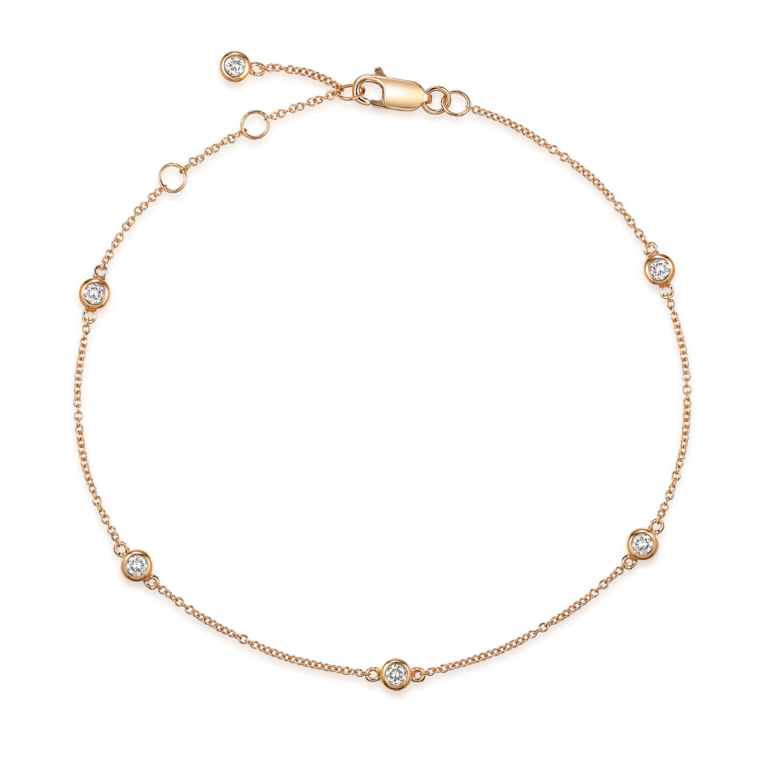 rose gold chain bracelet with diamonds spaced along the length on a white background 
