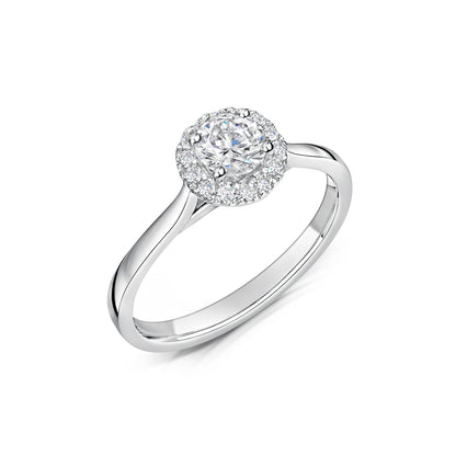 Round diamond halo engagement ring in platinum - angled on white background