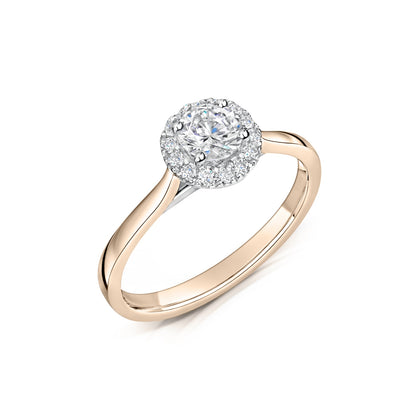 Round diamond halo engagement ring in rose gold - angled on white background