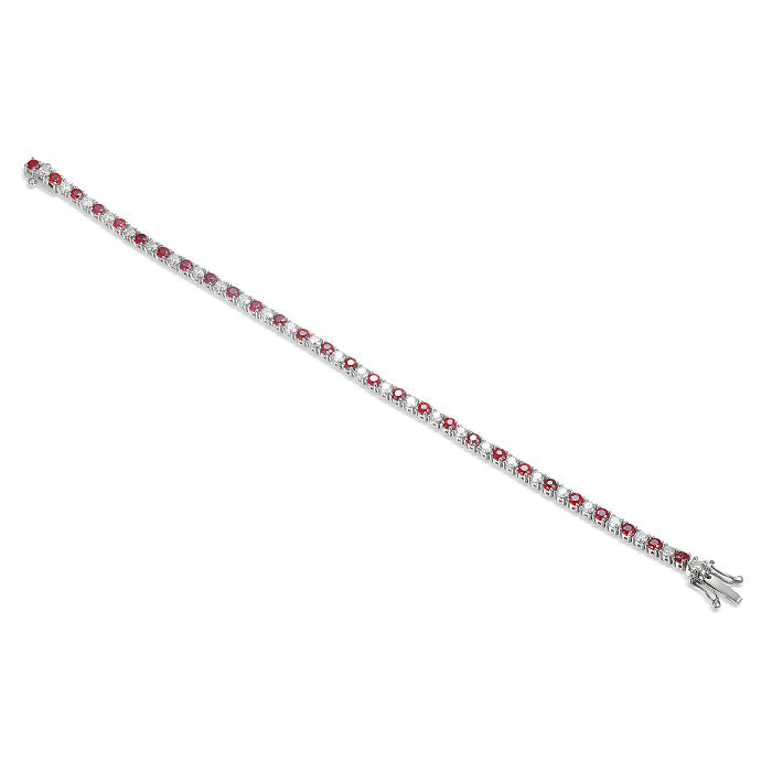 Ruby & Diamond Bracelet with alternating stones claw set on a white background