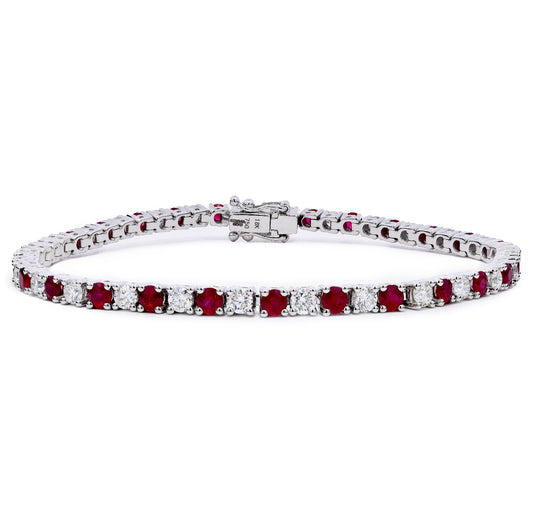 Ruby & Diamond Tennis Bracelet with alternating stones on a white background 