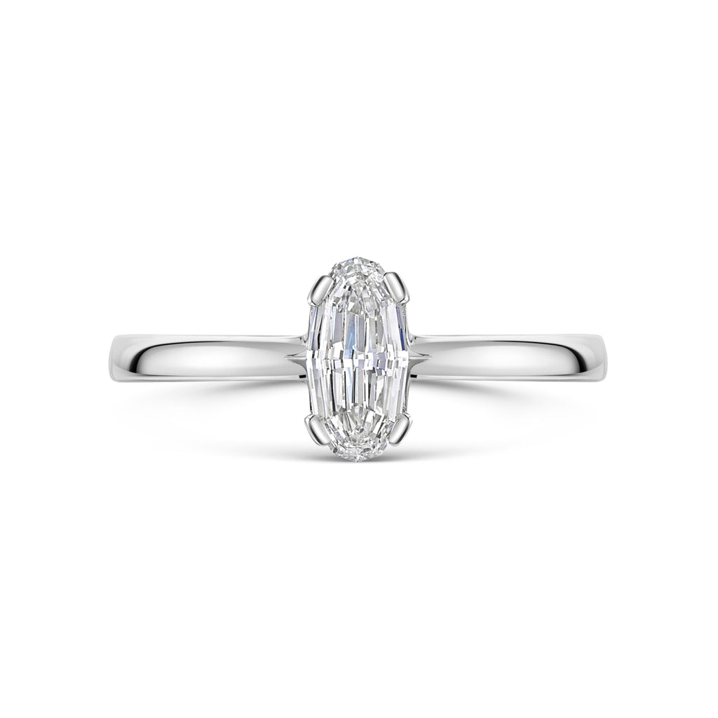 Diamond ring with an Oval mirror cut shaped center stone on a white background