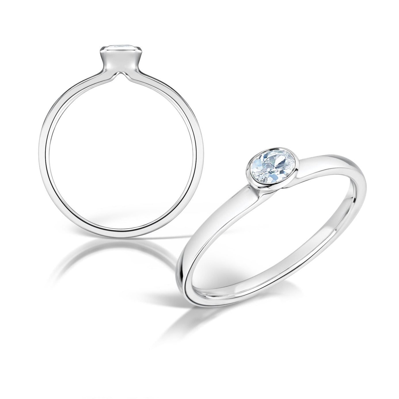 Small Oval Bezel Set East West Engagement Ring in 2 angles on a white background 