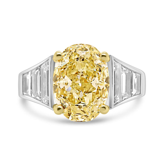 Unique Yellow Diamond Ring with Tapered Trapeze Diamond Shoulders on a white background
