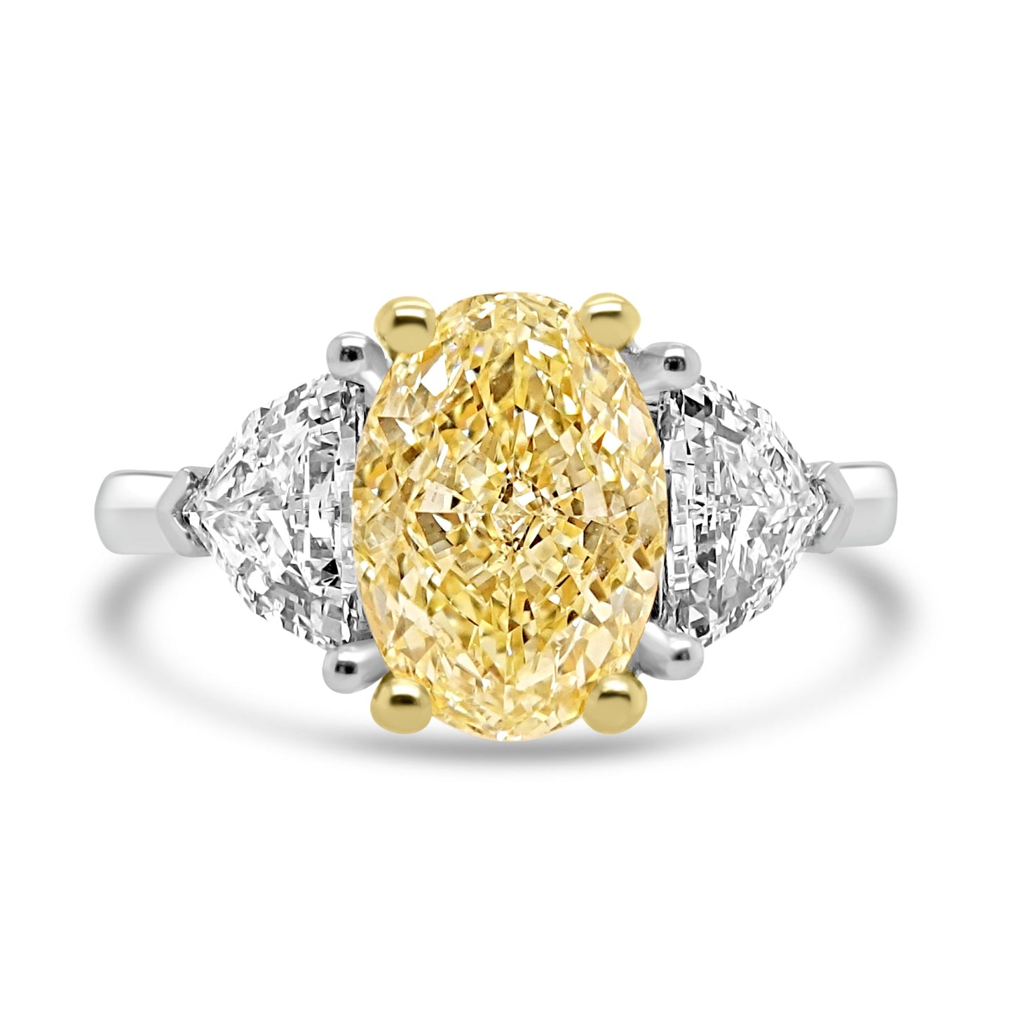 Yellow Diamond Trilogy Ring With Shield Diamond Outers on a white background