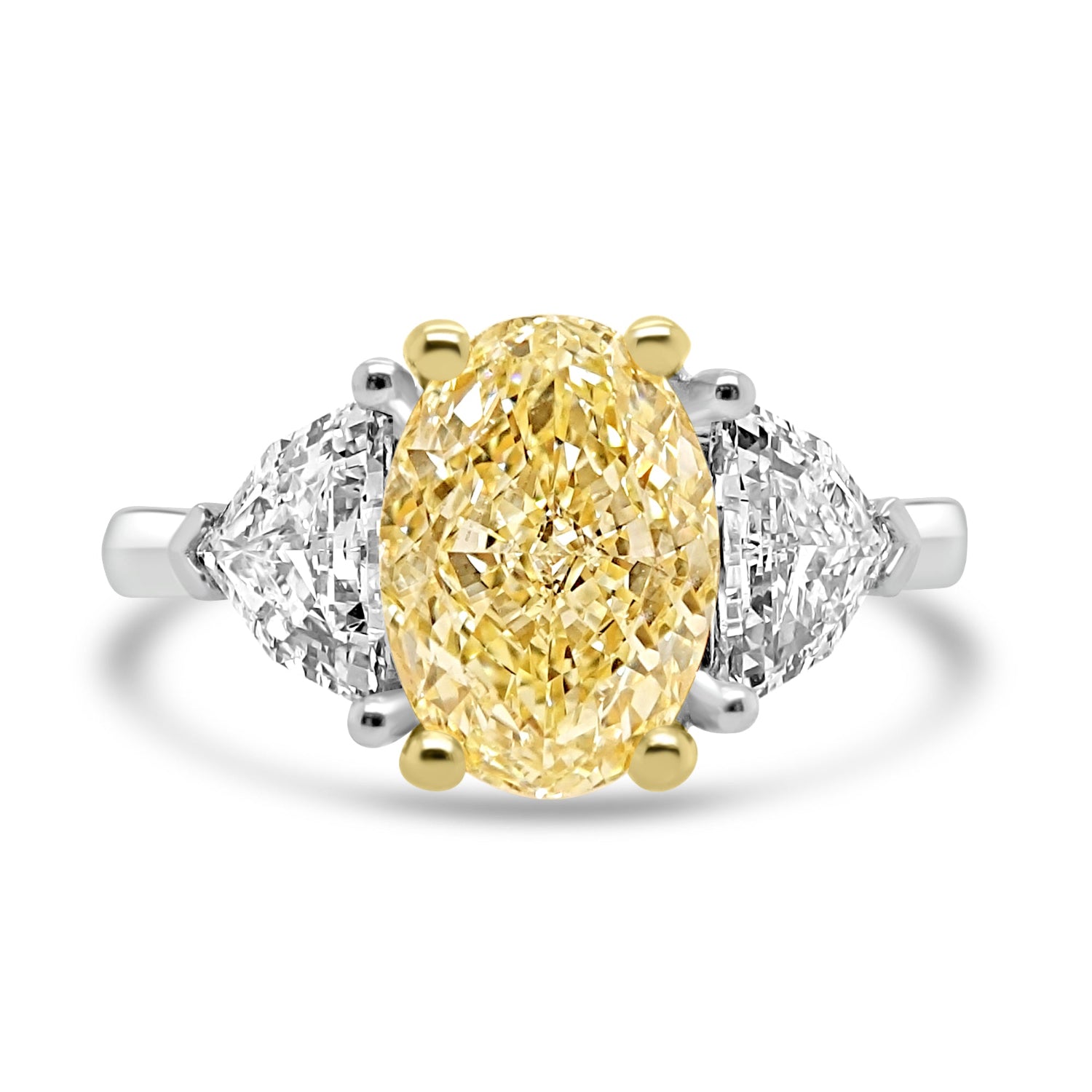 Yellow Diamond Trilogy Ring With Shield Diamond Outers on a white background