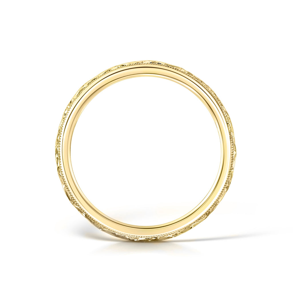 Side view of hand engraved floral wedding ring