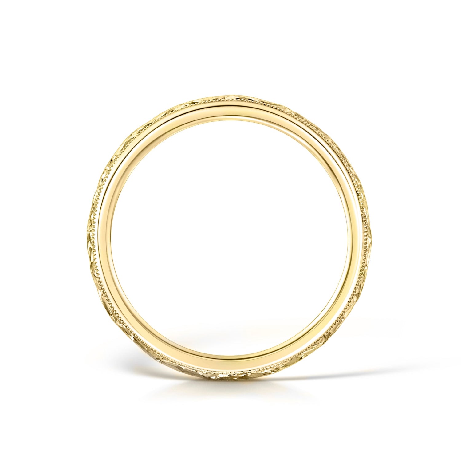 Side view of hand engraved floral wedding ring