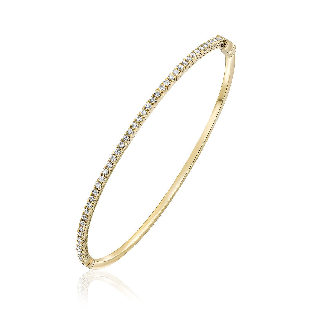 Diamond Bangle in 18ct Yellow Gold with white background.