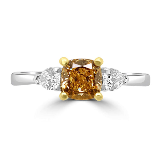 Fancy Brown Diamond Trilogy Ring on a white background.