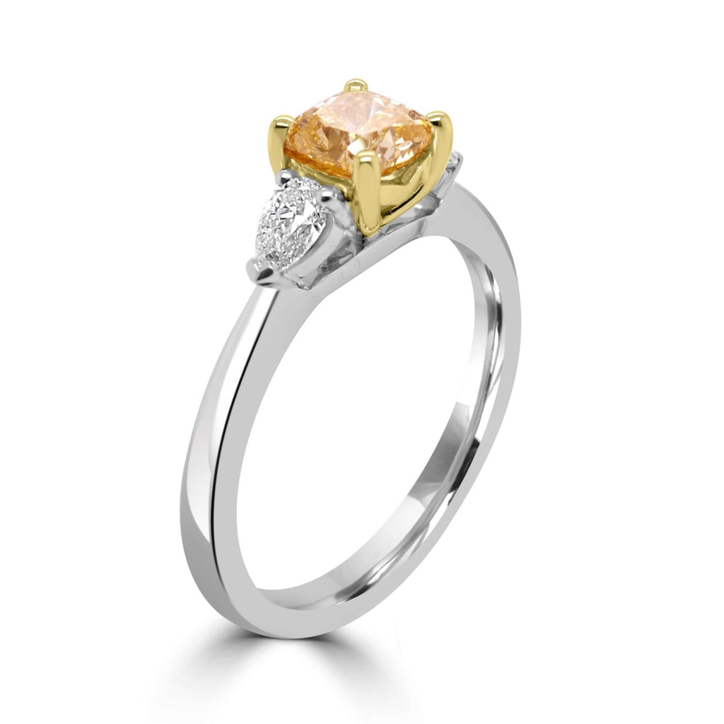 Fancy Brown Diamond Trilogy Ring side view on a white background.