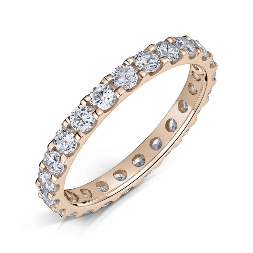 Rose Gold Eternity ring with 2.5mm diamonds all the way around on a white background.