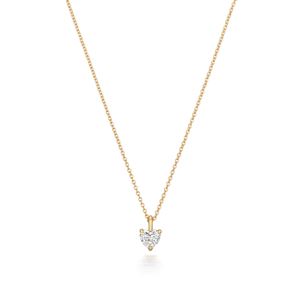 Heart Shaped Diamond Necklace in 18ct Yellow gold on a white background.
