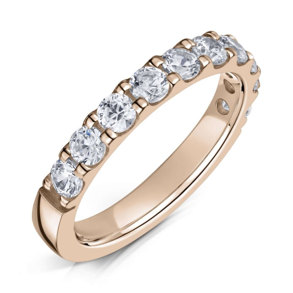 Rose Gold Eternity ring with 3.0mm diamonds half the way around on a white background.