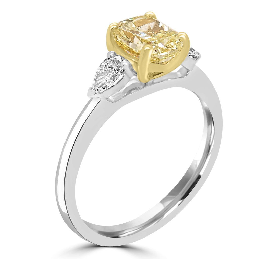 Fancy Yellow Diamond Engagement Ring aide view on a white background. 