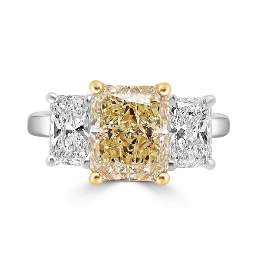Fancy Yellow Radiant Diamond Engagement Ring on a white background.