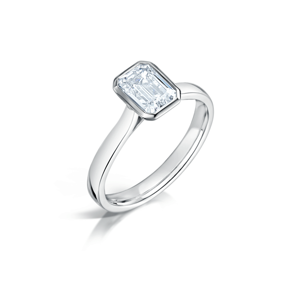 Minimal Emerald Cut Diamond Engagement ring with Bezel Setting